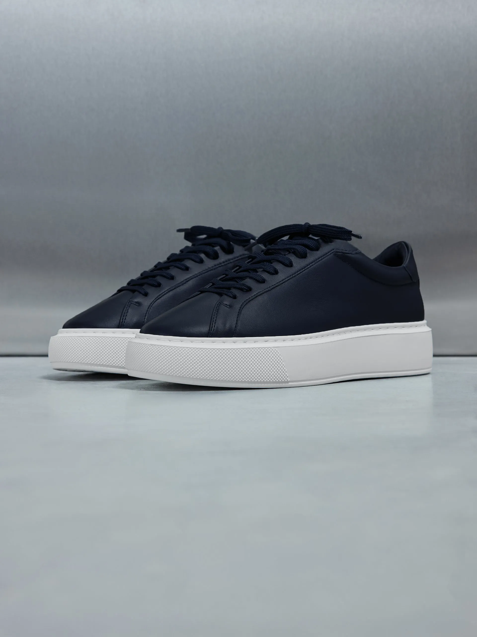 Essential Leather Trainer in Navy