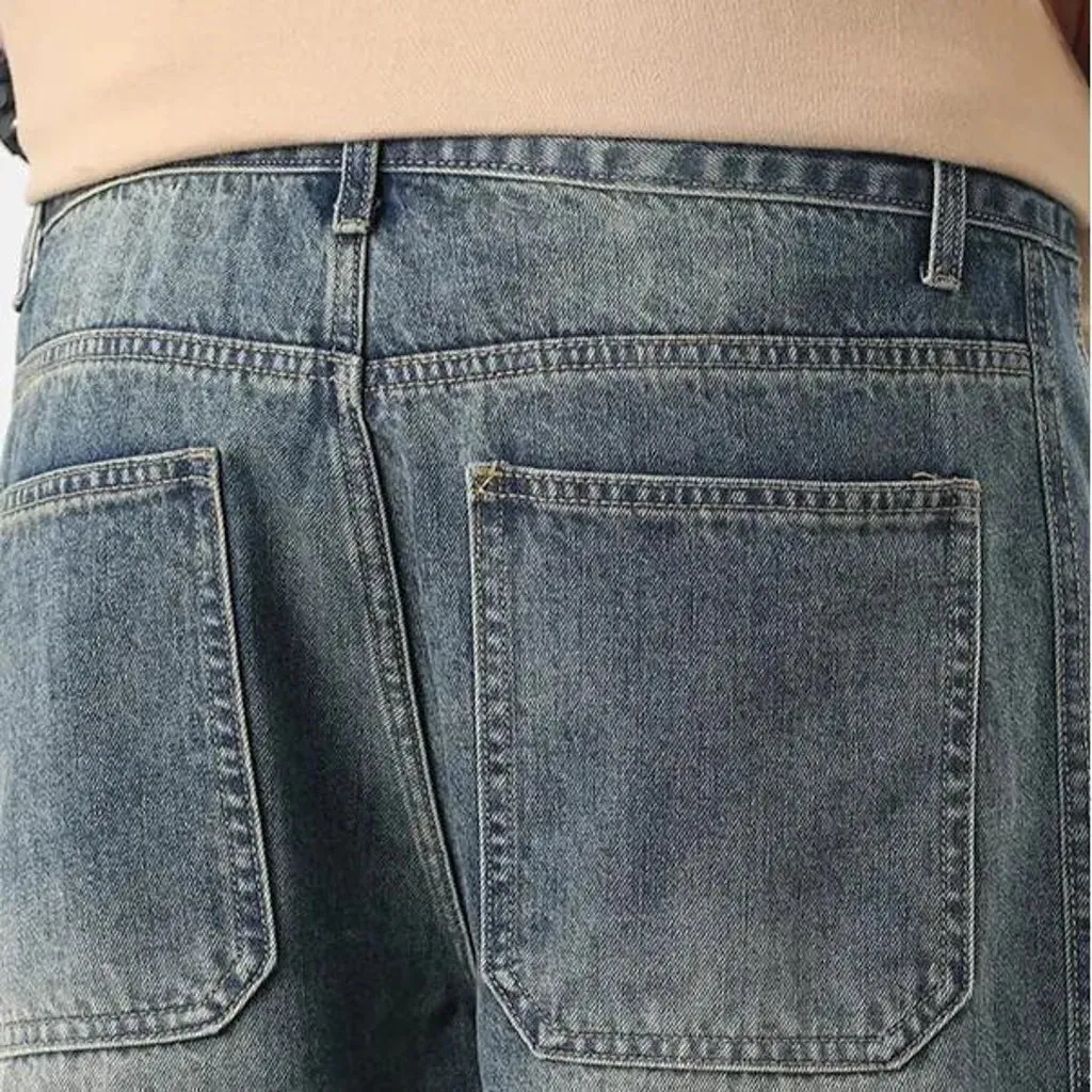 Sanded knee-length jeans shorts