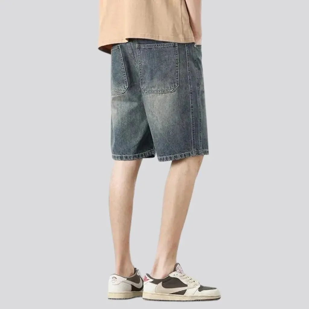 Sanded knee-length jeans shorts