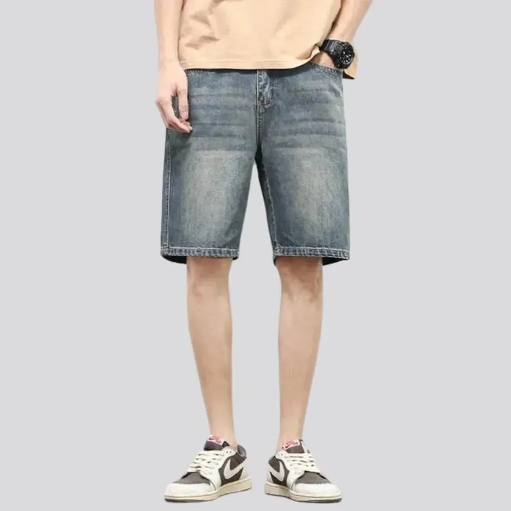 Sanded knee-length jeans shorts